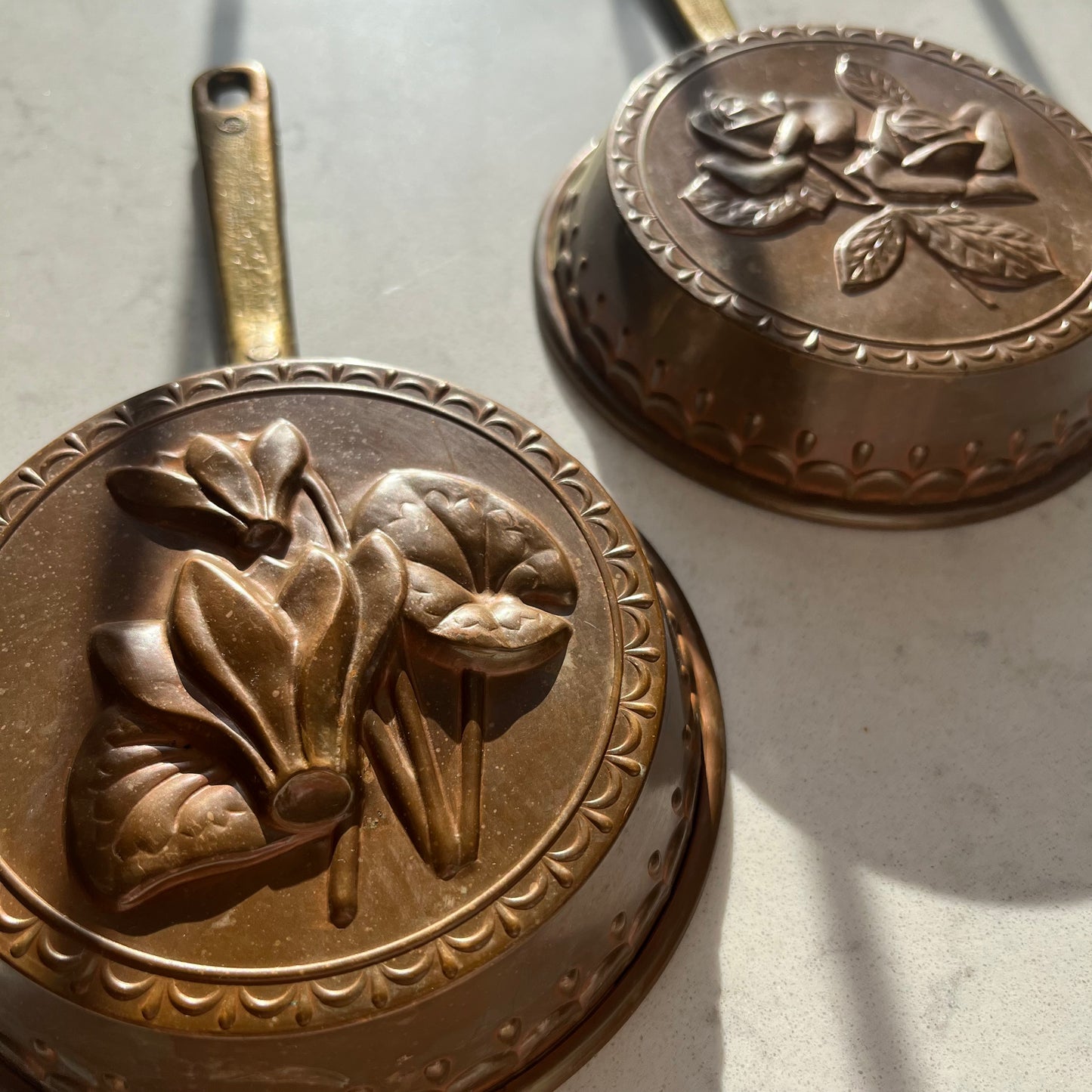 Copper & Brass Hanging Pans with Floral Detail